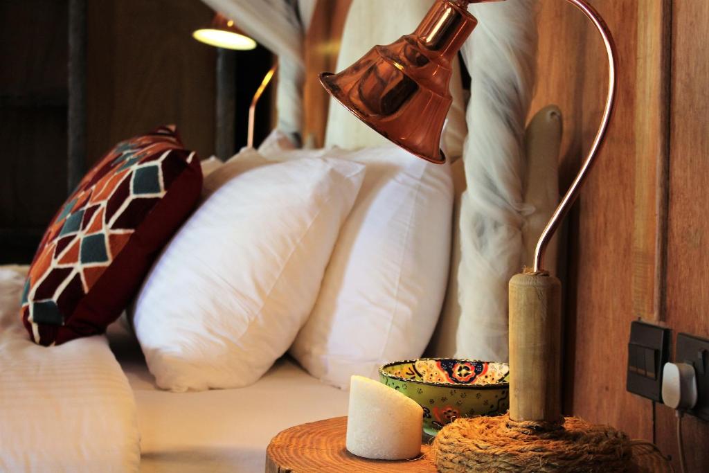 Postel nebo postele na pokoji v ubytování Souly Ecolodge Salalah