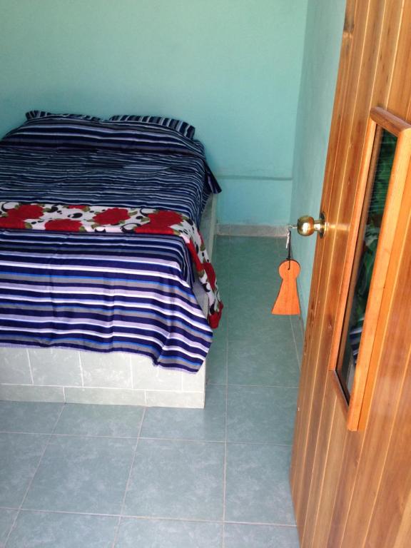Postel nebo postele na pokoji v ubytování Hotel Chaac Calakmul