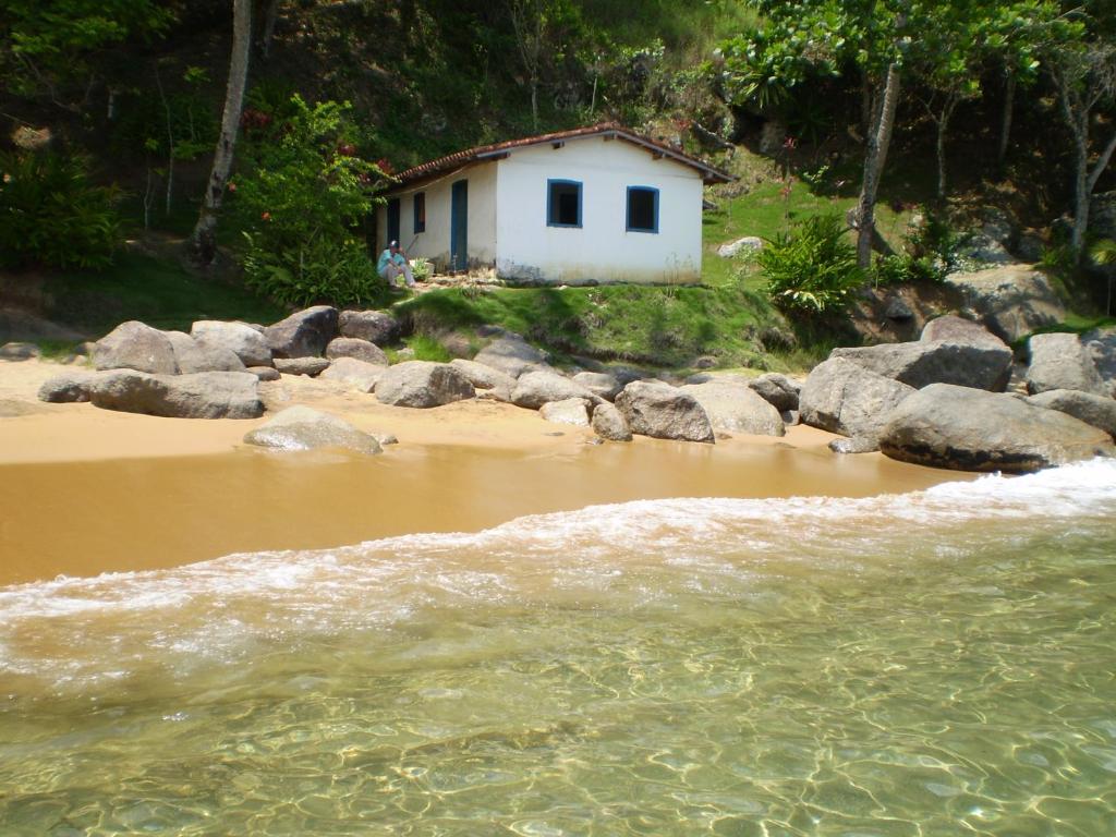  ALOHA em frente a praia- Suítes privativas & hostel