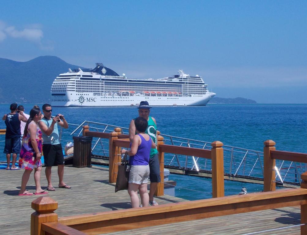  ALOHA em frente a praia- Suítes privativas & hostel
