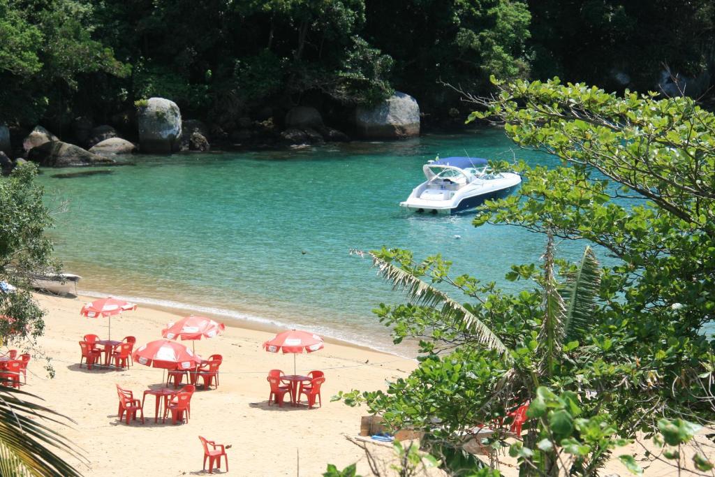  ALOHA em frente a praia- Suítes privativas & hostel