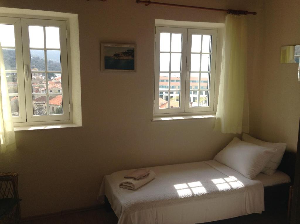 Posteľ alebo postele v izbe v ubytovaní Apartments Bianki