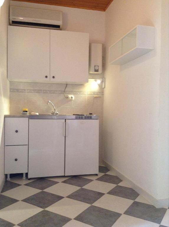 Kuchyňa alebo kuchynka v ubytovaní Apartments Bianki