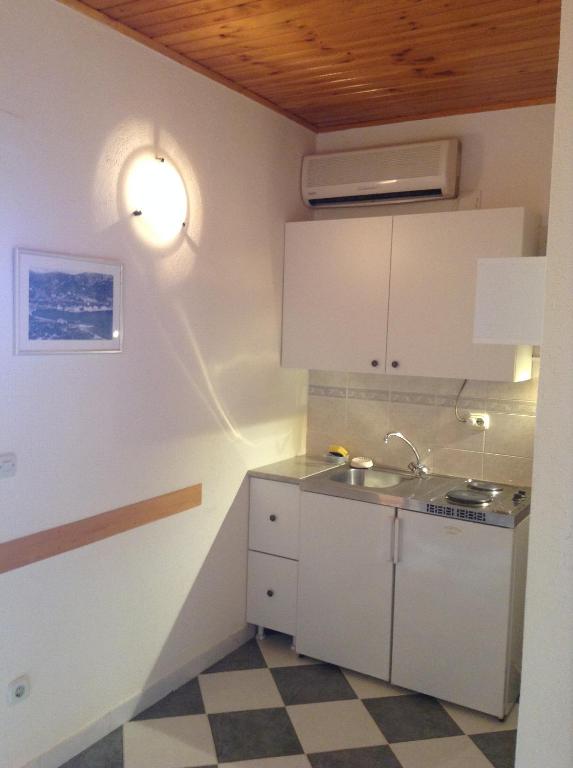 Kuchyňa alebo kuchynka v ubytovaní Apartments Bianki