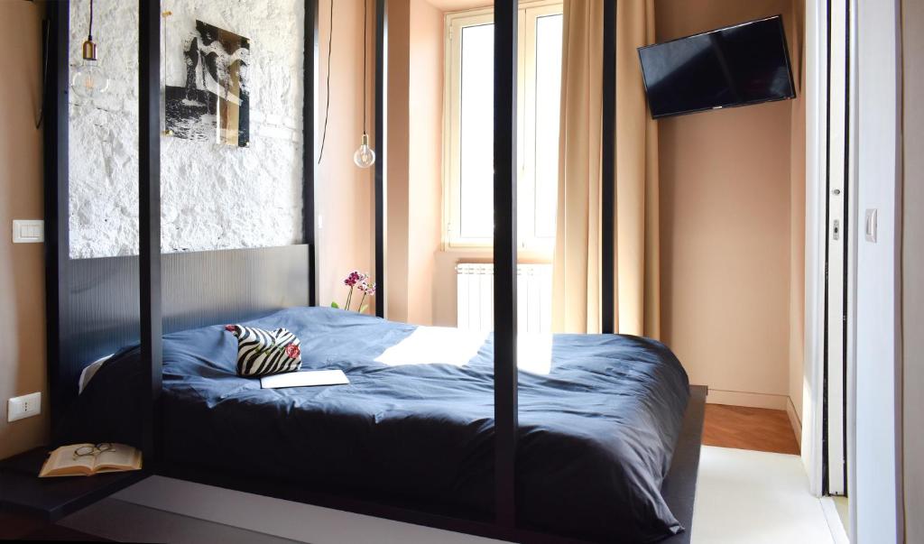 Postel nebo postele na pokoji v ubytování Bibi e Romeo's Home