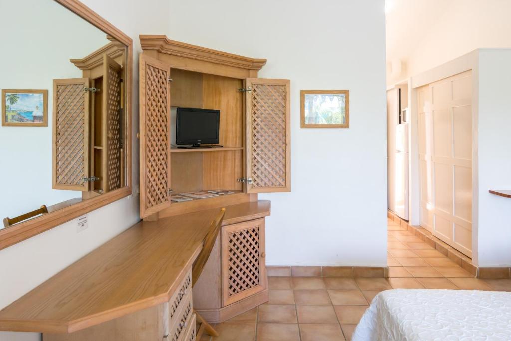 TV a/nebo společenská místnost v ubytování Residence Les Cayalines