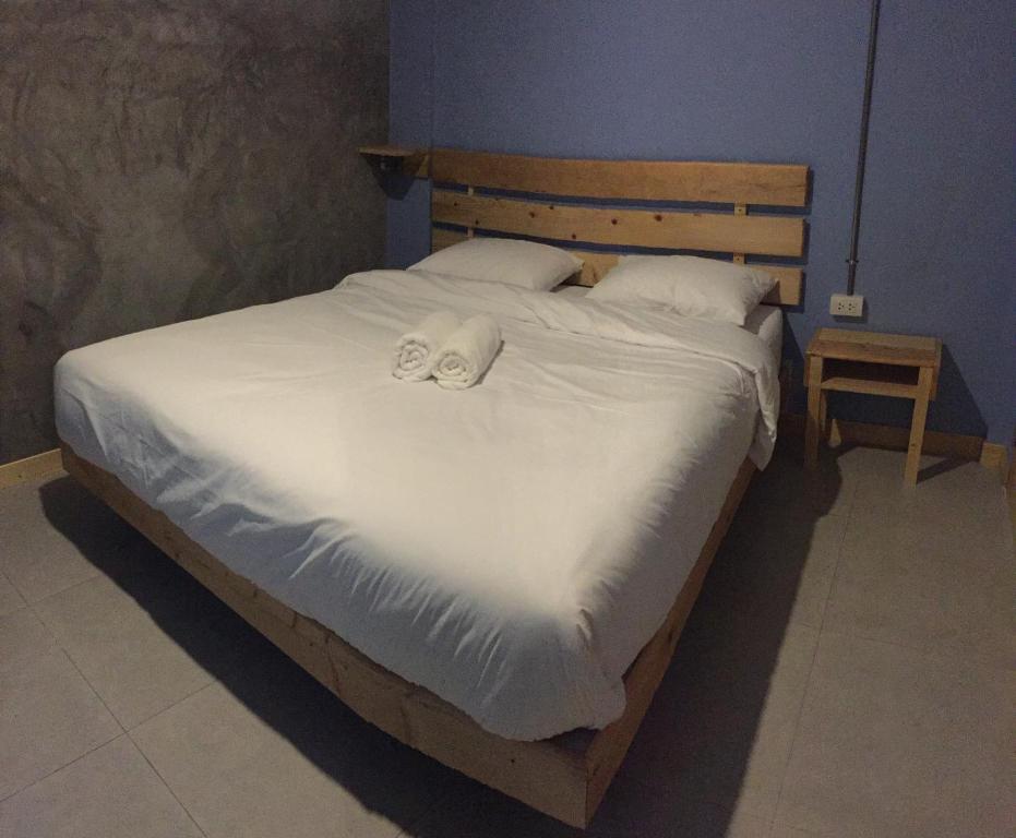 Postel nebo postele na pokoji v ubytování Rest Time Hotel