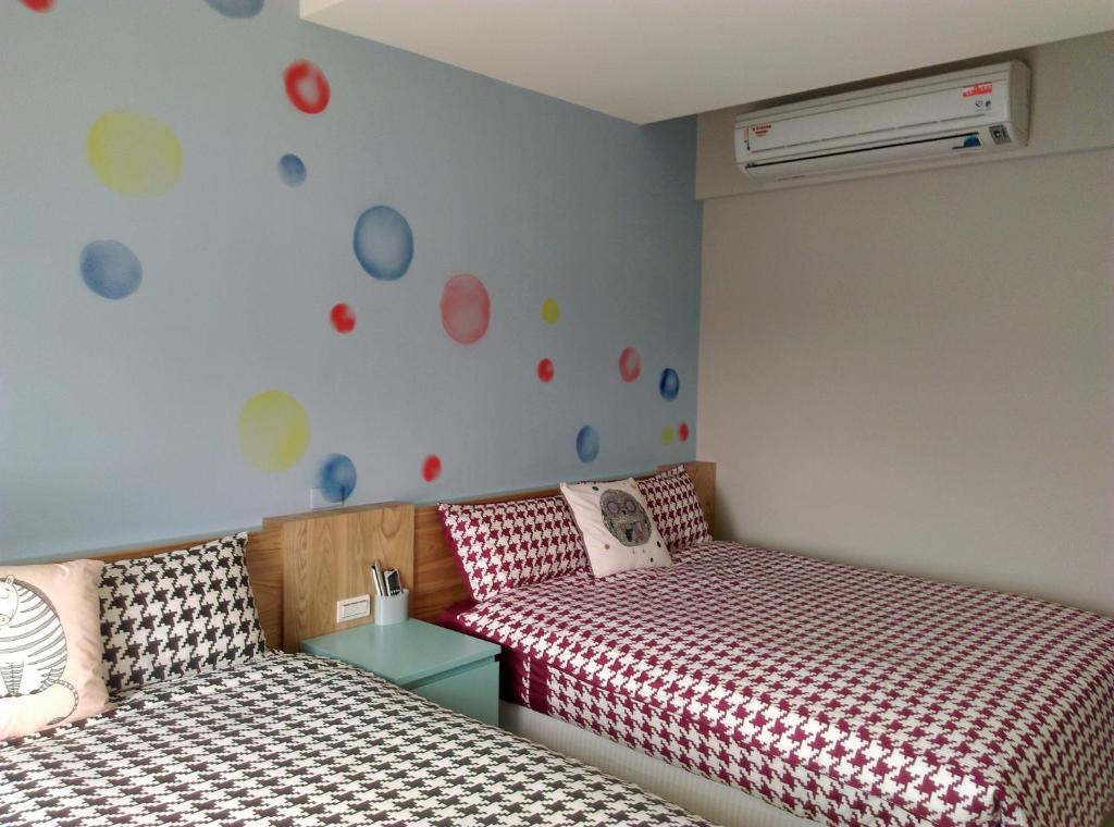 Postel nebo postele na pokoji v ubytování Shuiquan 19N