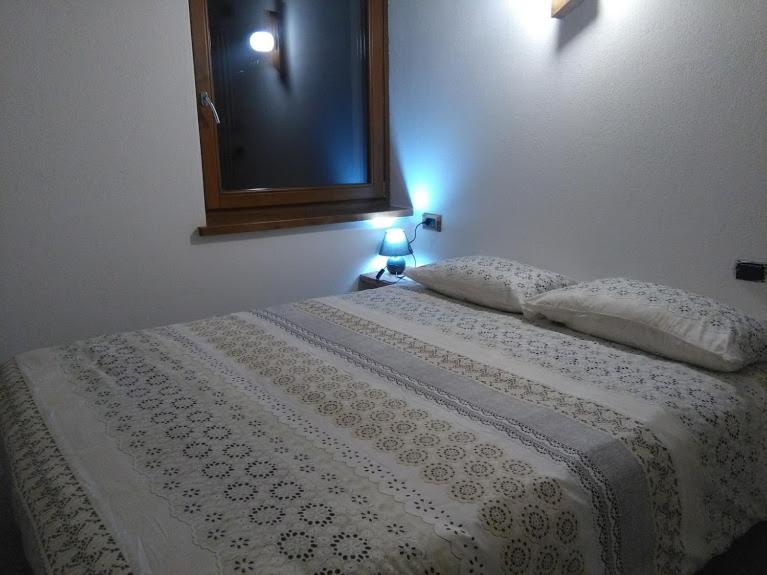 Postel nebo postele na pokoji v ubytování Appartamento Sole