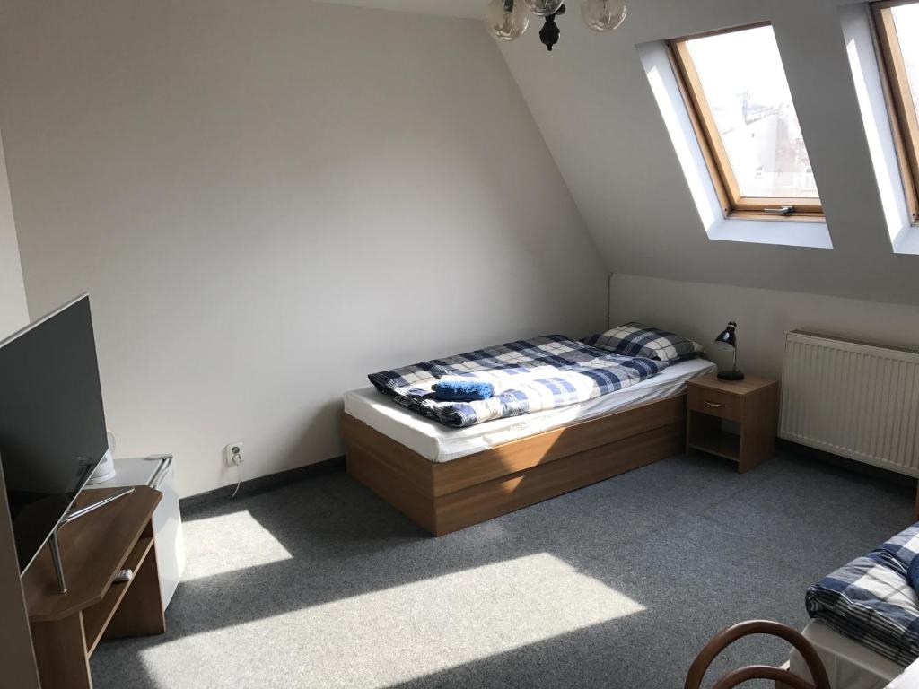 Postel nebo postele na pokoji v ubytování Penzión Dobré Časy