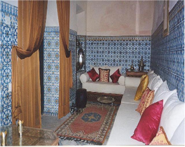 Postel nebo postele na pokoji v ubytování Riad El Filali