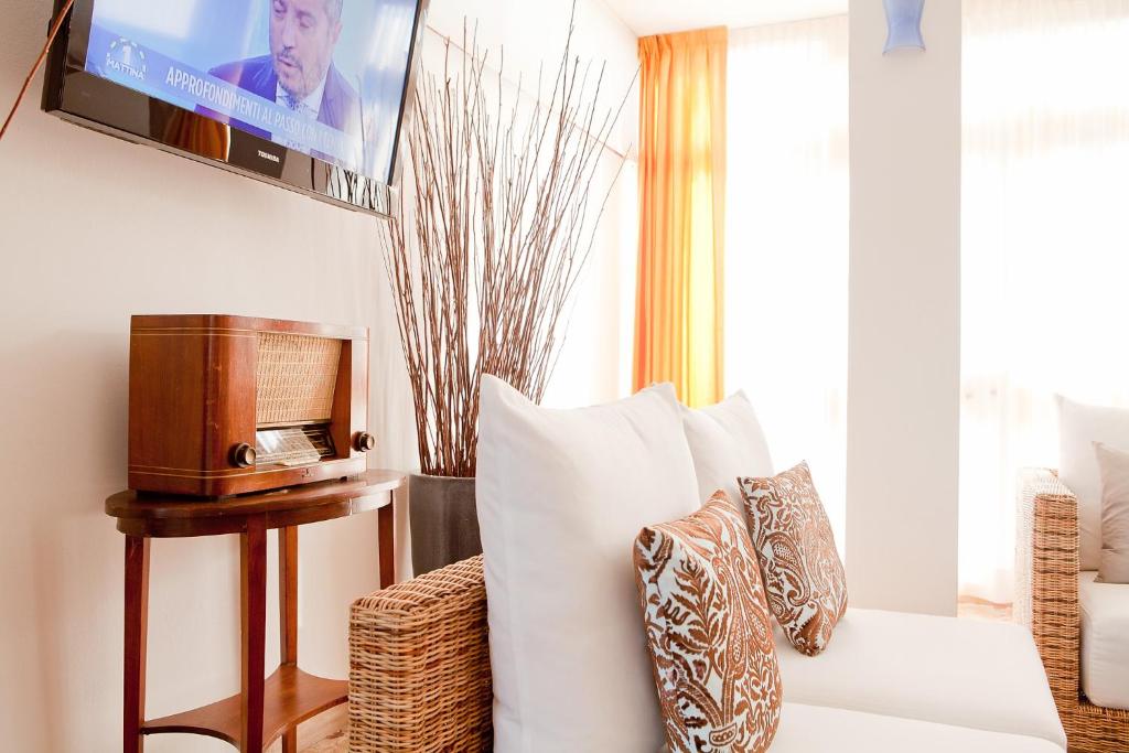 TV a/nebo společenská místnost v ubytování Hotel Horizonte