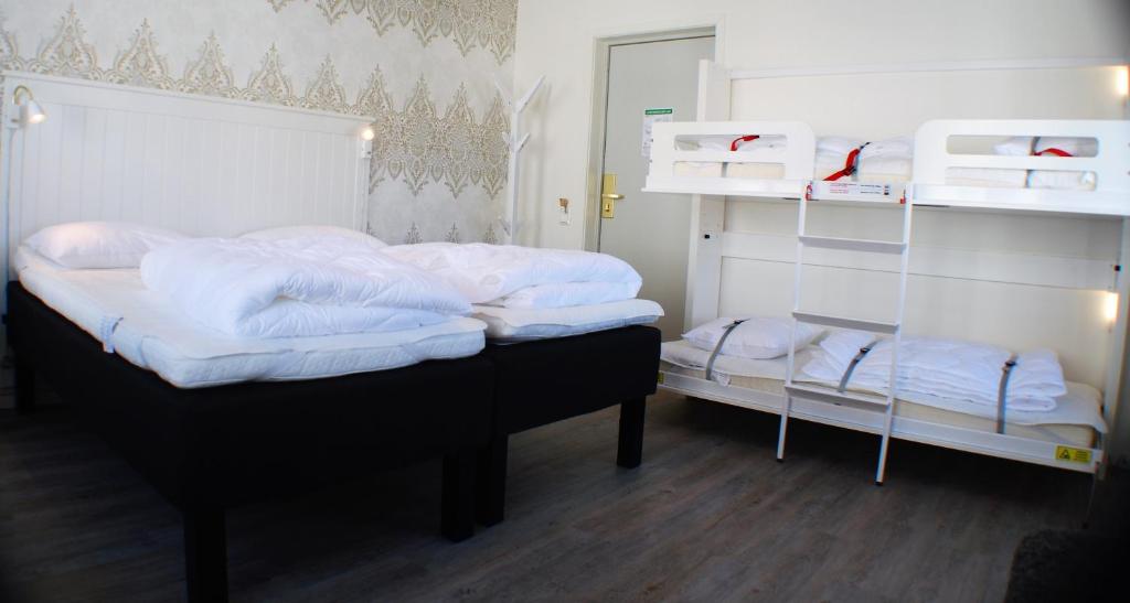 Postel nebo postele na pokoji v ubytování Go to sleep Arvika