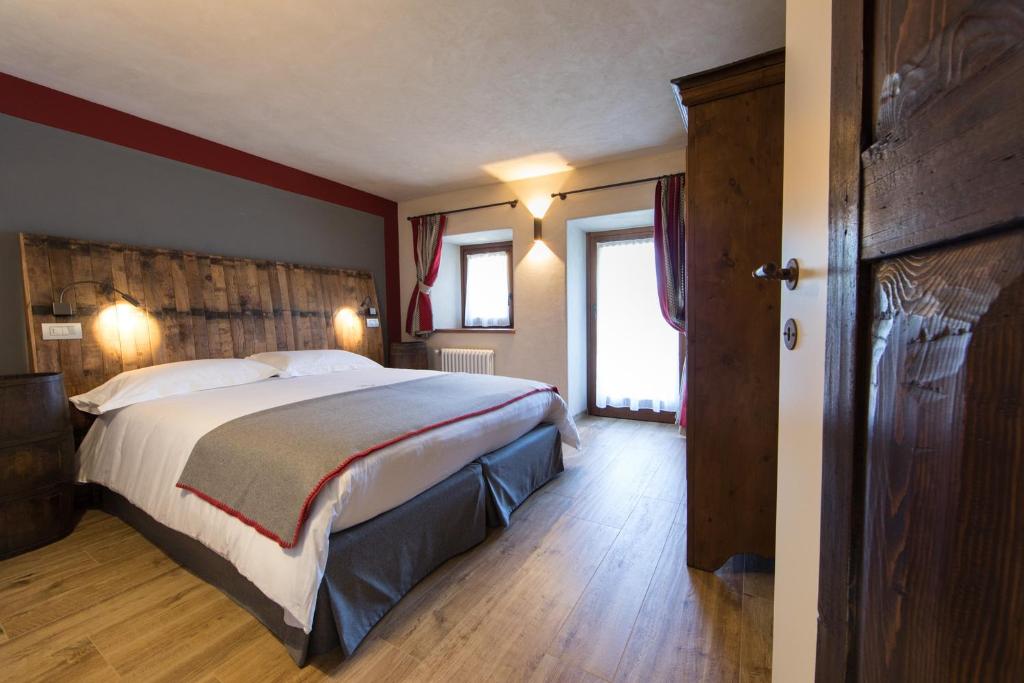 Postel nebo postele na pokoji v ubytování Maison Lo Triolet
