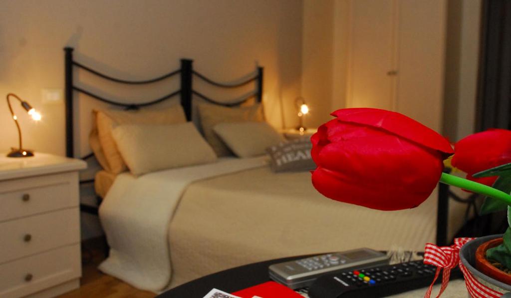 Posteľ alebo postele v izbe v ubytovaní L'Iris B&B
