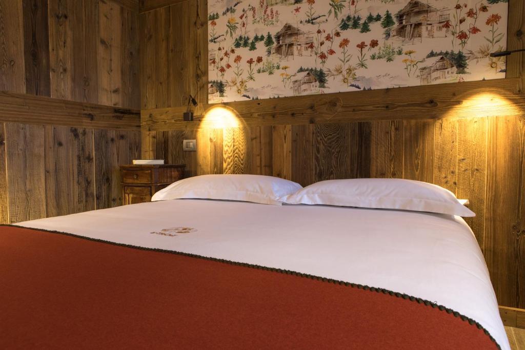 Postel nebo postele na pokoji v ubytování Maison Lo Triolet