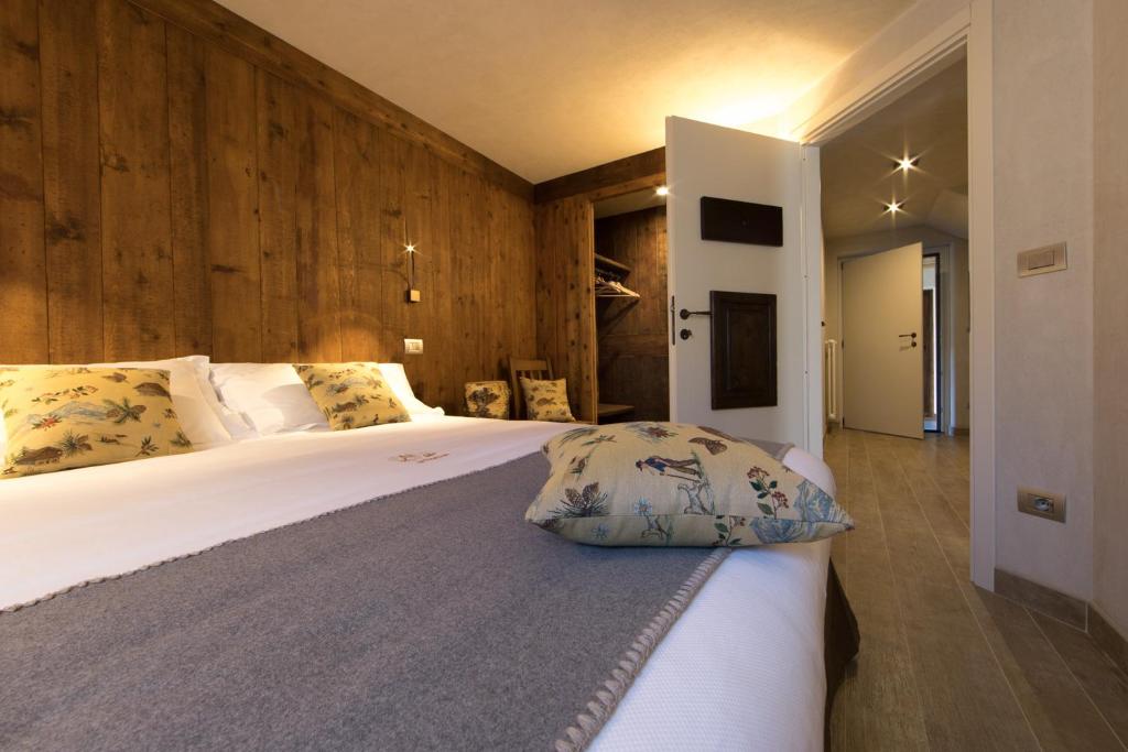 Postel nebo postele na pokoji v ubytování Maison Lo Triolet