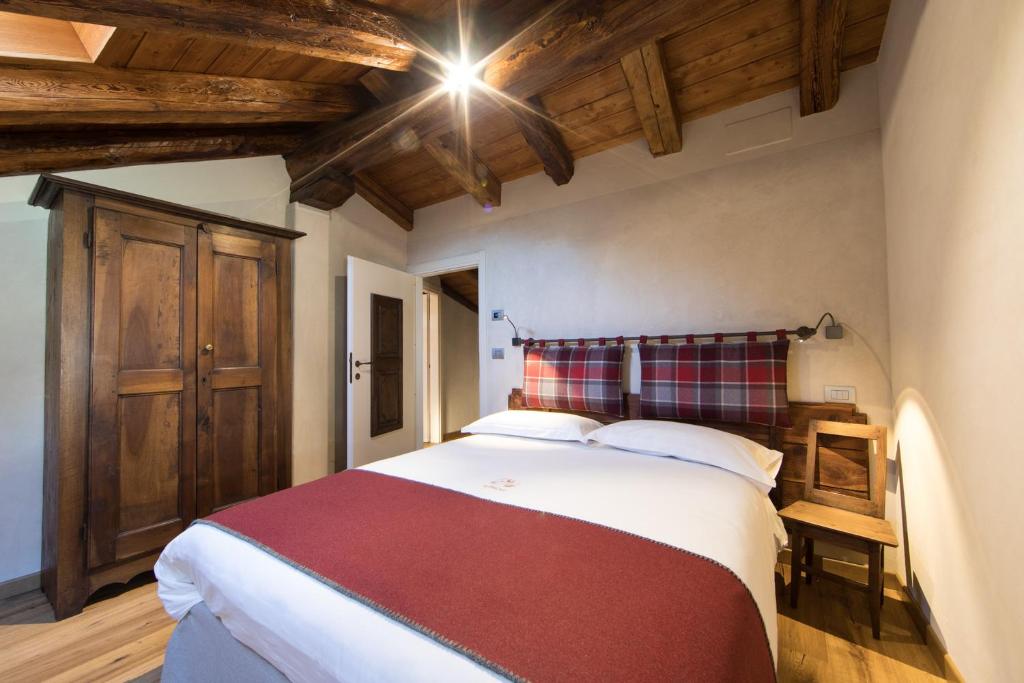 Postel nebo postele na pokoji v ubytování Maison Lo Triolet