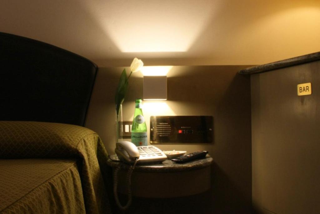 Postel nebo postele na pokoji v ubytování Hotel Motel 2000