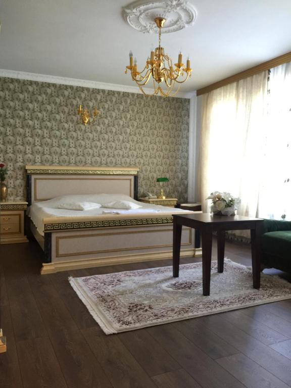 Postel nebo postele na pokoji v ubytování Hotel Adria