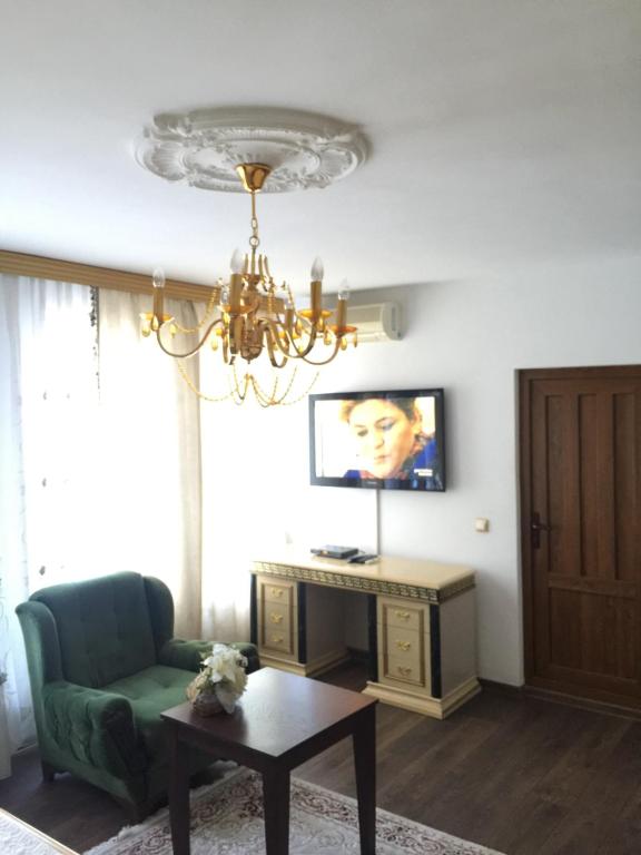 TV a/nebo společenská místnost v ubytování Hotel Adria