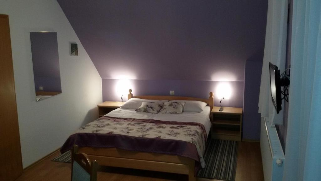Posteľ alebo postele v izbe v ubytovaní Guest House Wolf