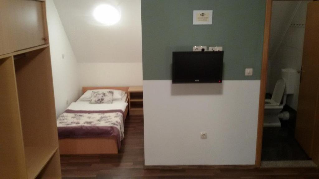 Posteľ alebo postele v izbe v ubytovaní Guest House Wolf