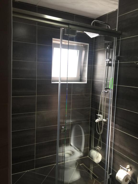 Koupelna v ubytování Hotel Adria