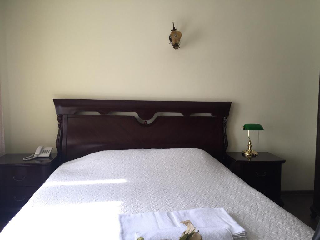 Postel nebo postele na pokoji v ubytování Hotel Adria