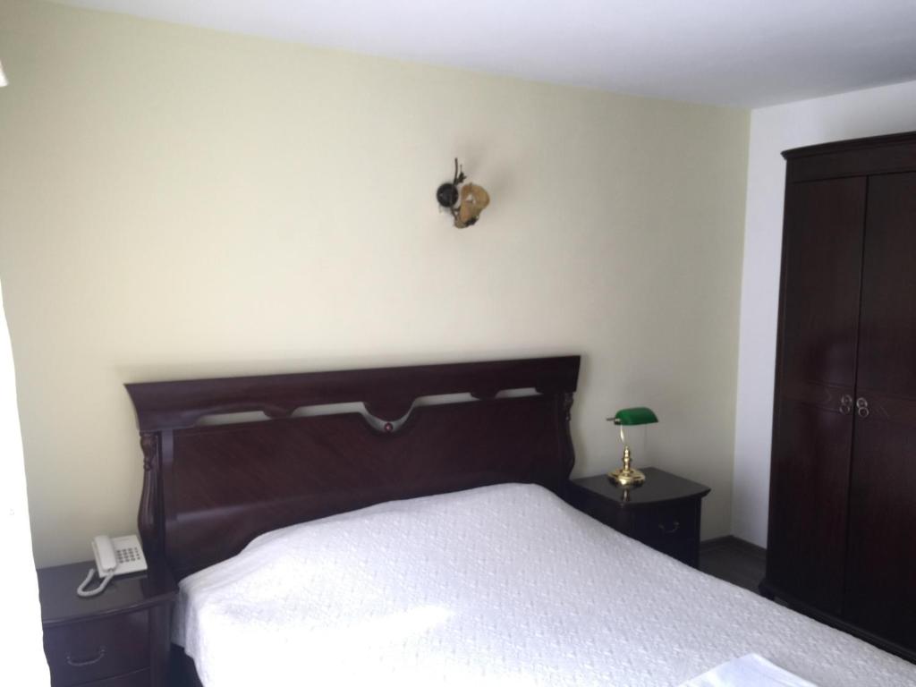 Postel nebo postele na pokoji v ubytování Hotel Adria
