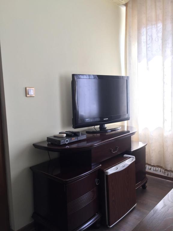 TV a/nebo společenská místnost v ubytování Hotel Adria