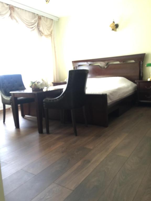 Postel nebo postele na pokoji v ubytování Hotel Adria