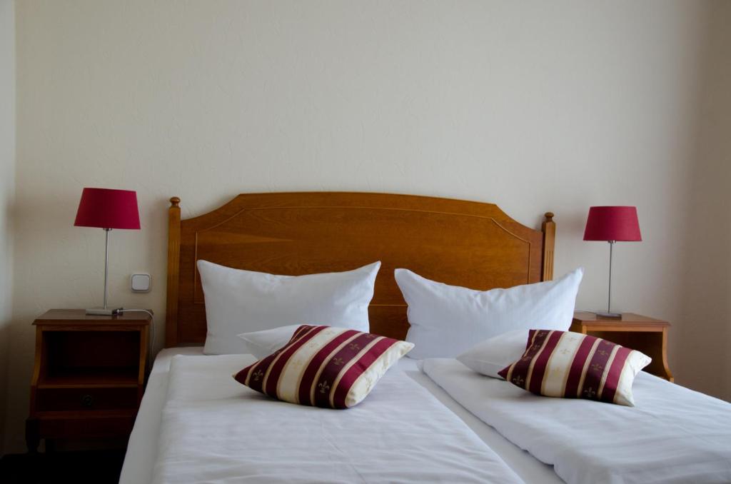 Postel nebo postele na pokoji v ubytování Mercure Hotel Plaza Magdeburg