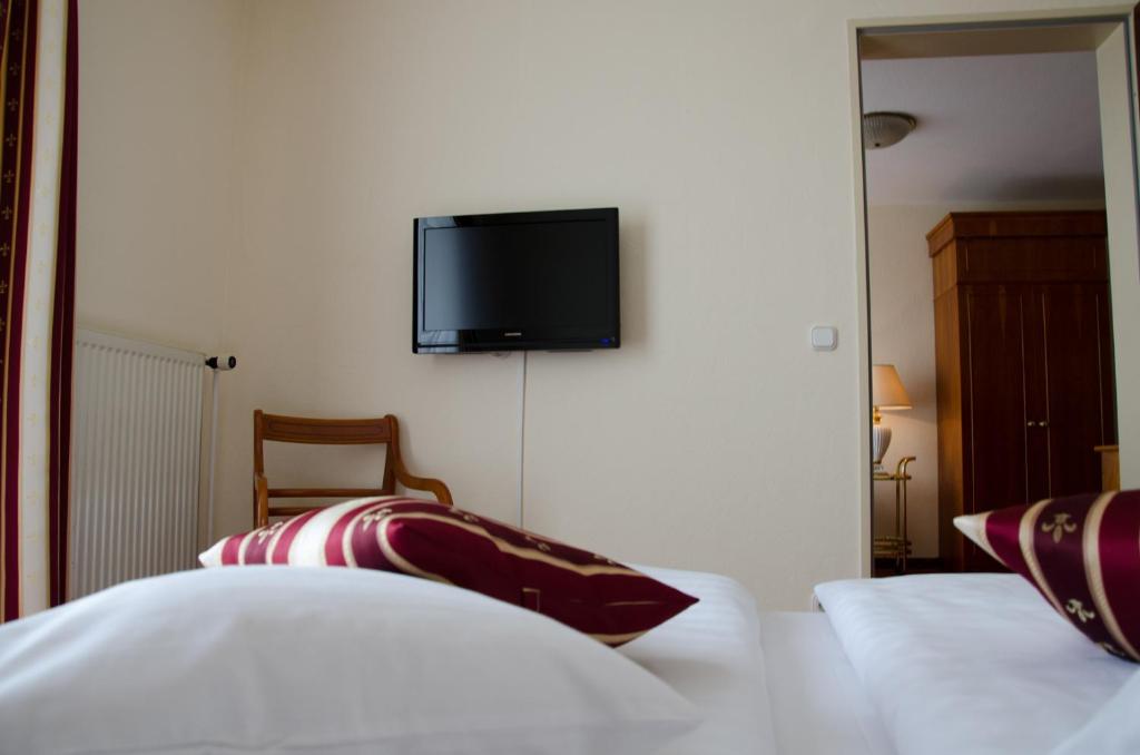 Postel nebo postele na pokoji v ubytování Mercure Hotel Plaza Magdeburg