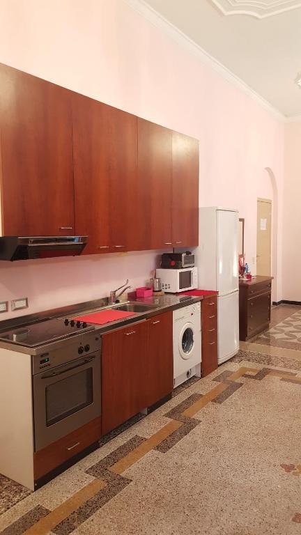 Kuchyň nebo kuchyňský kout v ubytování Royal Suite