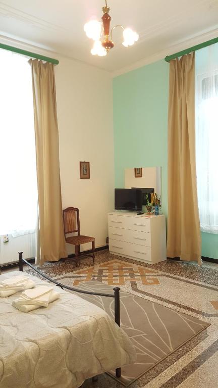 Postel nebo postele na pokoji v ubytování Royal Suite