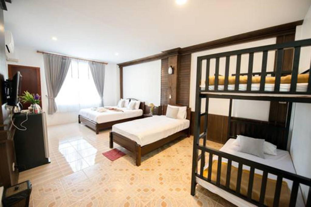 Lanta Nice Beach House - Habitación Familiar