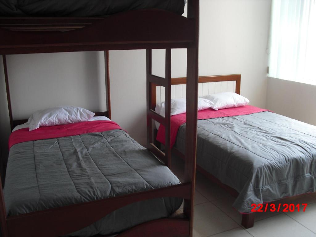 Postel nebo postele na pokoji v ubytování Kelebek Hostel