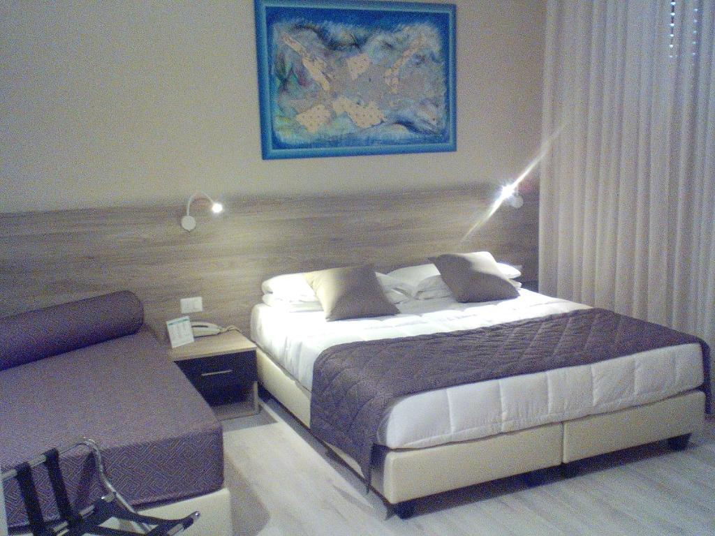Postel nebo postele na pokoji v ubytování Hotel Citta'