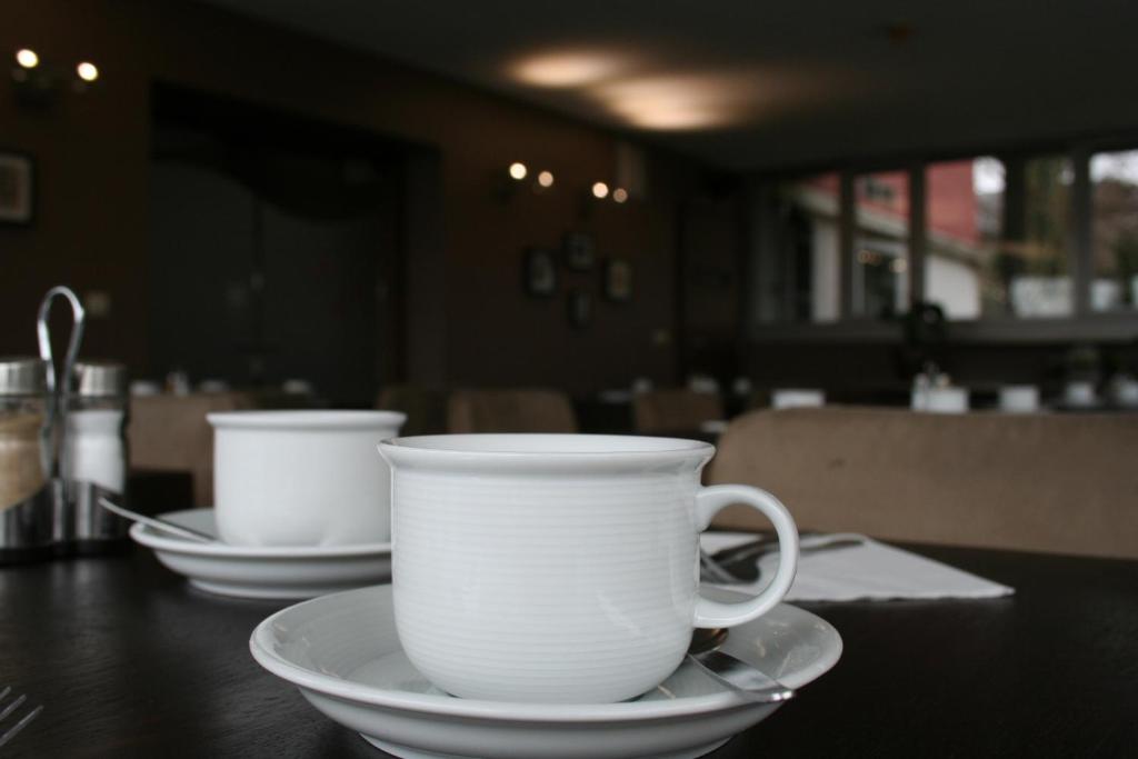 Příslušenství pro přípravu čaje a kávy v ubytování Hotel Sirius