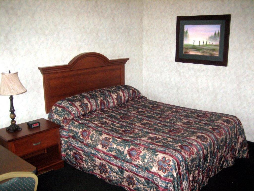 Postel nebo postele na pokoji v ubytování Fair Motel