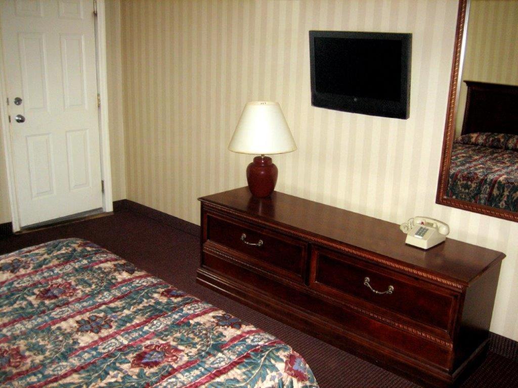 Postel nebo postele na pokoji v ubytování Fair Motel