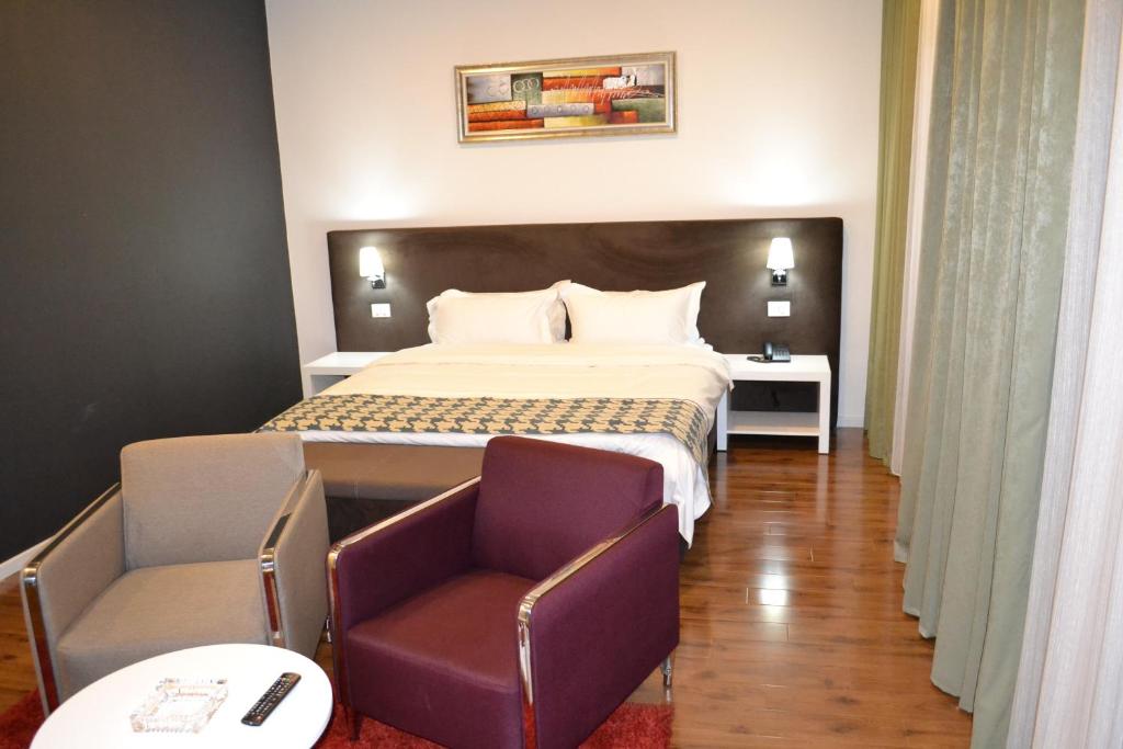 Postel nebo postele na pokoji v ubytování Havana Hotel