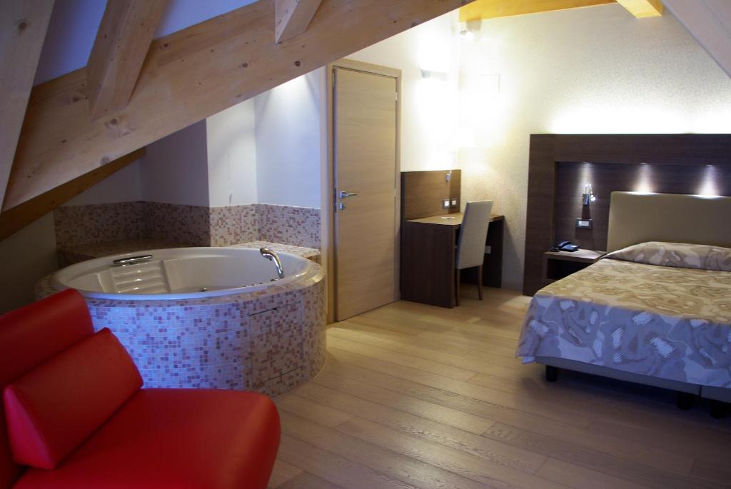 Postel nebo postele na pokoji v ubytování Grand Hotel Miramonti