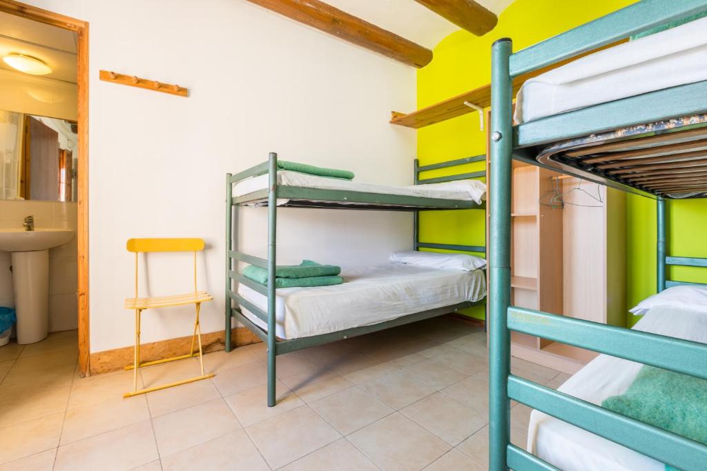 Postel nebo postele na pokoji v ubytování Alberg La Solana