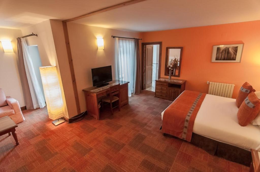 TV a/nebo společenská místnost v ubytování Hotel Vilagaros