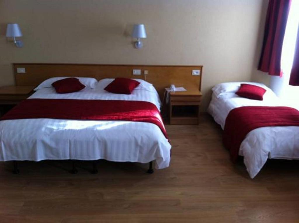 Postel nebo postele na pokoji v ubytování Grand Hotel Miramonti