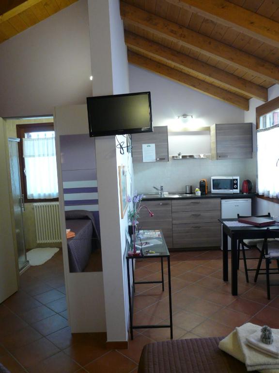 Kuchyň nebo kuchyňský kout v ubytování B&B LA Garzetta
