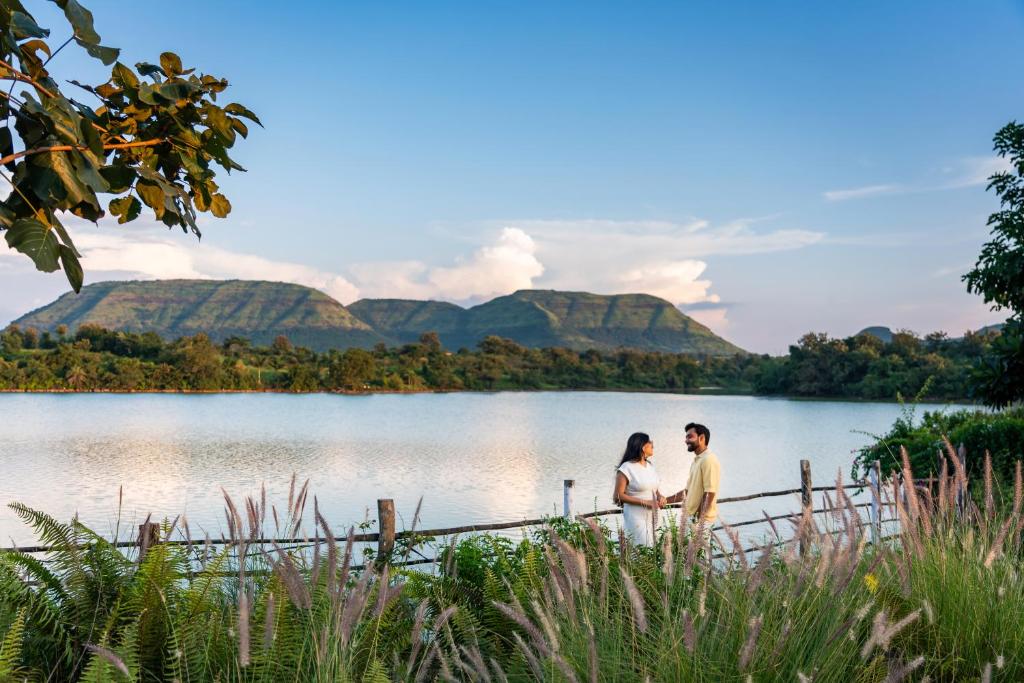SaffronStays Lake House Bouganvillea, Nashik - rustic pool villa with great lake views and patio dining
