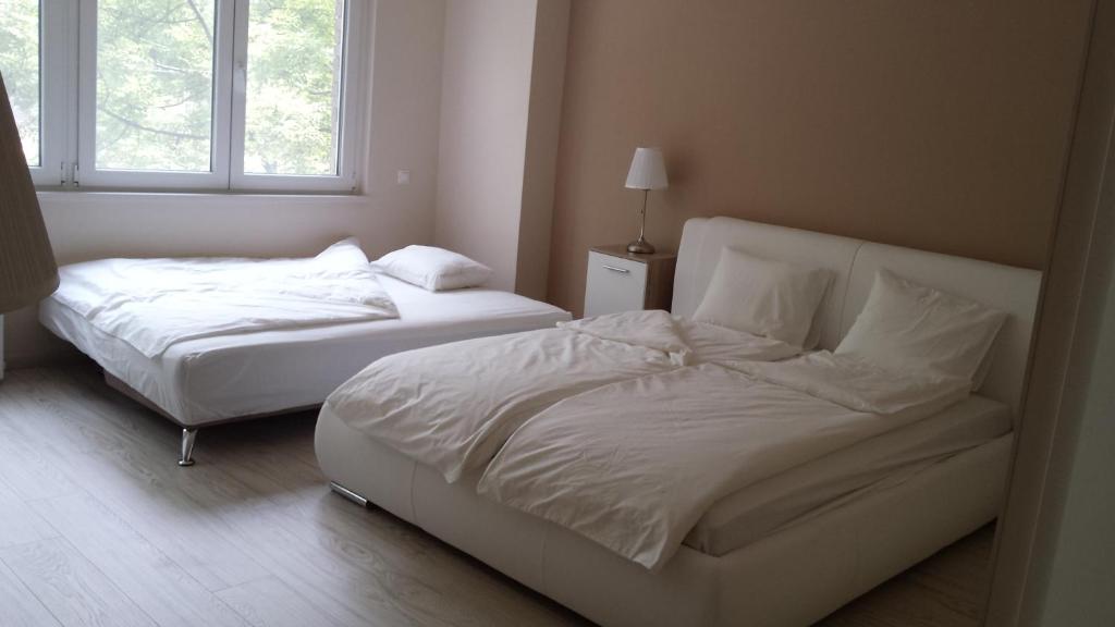 Posteľ alebo postele v izbe v ubytovaní Brand new apartment in the center